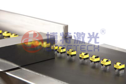 绿光激光打标机在变压器行业中实行喷码作用